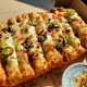 Image for article titled The Best Order at Toppers Pizza Isn’t the Pizza